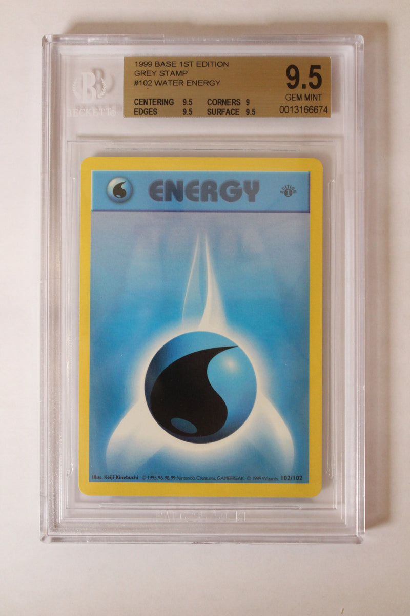 Water Energy (102/102) 1st Edition/Grey Stamp [Base Set (Shadowless)] Beckett 9.5